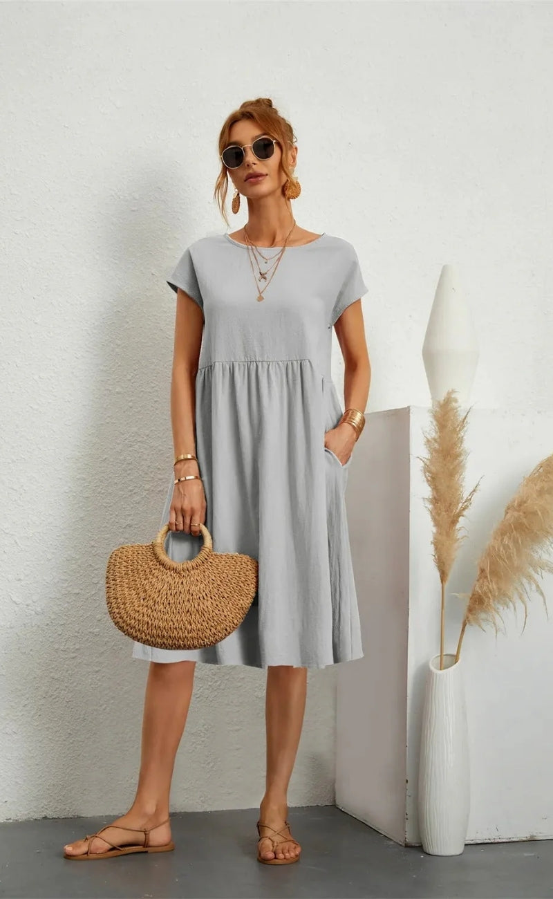 Damen Midikleid mit Rundhalsausschnitt und kurzen Ärmeln mit Taschen