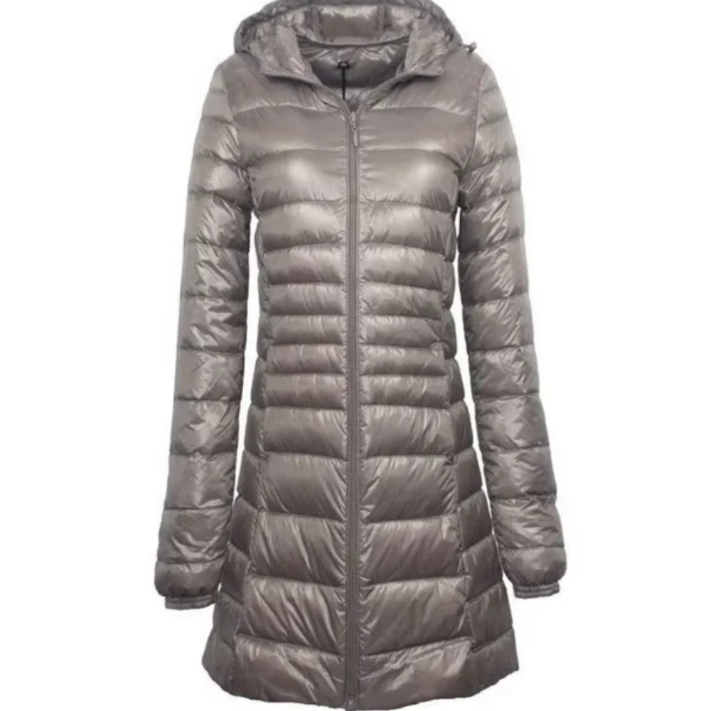Glänzende lange Puffer-Winterjacke - leichter, warmer Mantel für Frauen bei kaltem Wetter